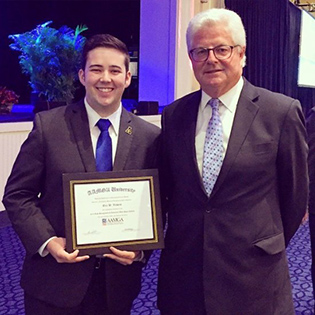 Eric Vickers and Lloyd's Chairman John Nelson at 2015 AAMGA Convention