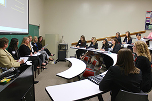 Students interacting with business leaders at Business Connections event