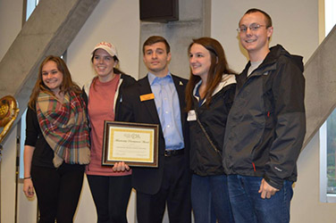 IBSA club representatives, pictured from left, Rachel Drye, Dawson Gould, Hathum Hamam, Allison DiCarlo and Jeffrey Burruss accept a Membership Development Award.