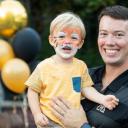 Dr. David English '04 '06 enjoys Homecoming 2018 with his son Harrison. Photo by Chase Reynolds