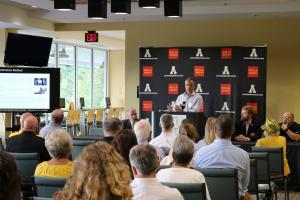 CERPA Director Ash Morgan delivers comments on the economic impact of App State Athletics during the Aug. 25, 2017 Wake up Watauga event, hosted by the Boone Area Chamber of Commerce (Photo: Boone Area Chamber of Commerce)
