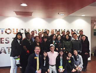 Appalachian and Fudan Holland Fellows students at Krispy Kreme headquarters