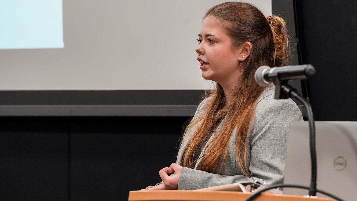 Karlee Cook presents at the 3MT competition at App State. Cook earned second place overall.