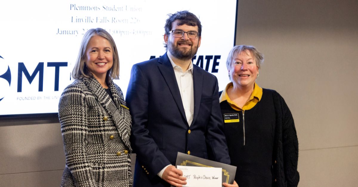 From left are Dean Ashley Colquitt, Stevevn Vogel, and Provost Neva Specht