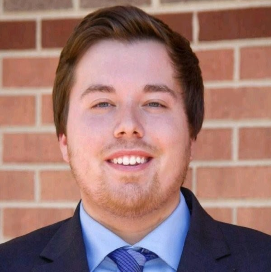 Professional headshot portrait of alumni
