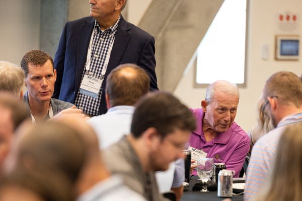 Dr. Justin Cox, left, and&nbsp;Dr. Harry Davis&nbsp;with attendees of NCBA's NC School of Banking, held at App State.&nbsp;