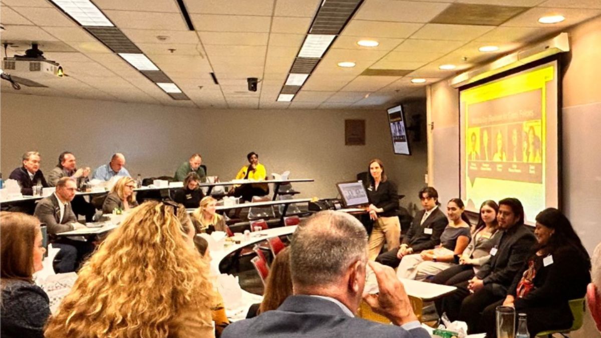 Martha Guy students presenting to Business Advisory Council in a classroom at App State