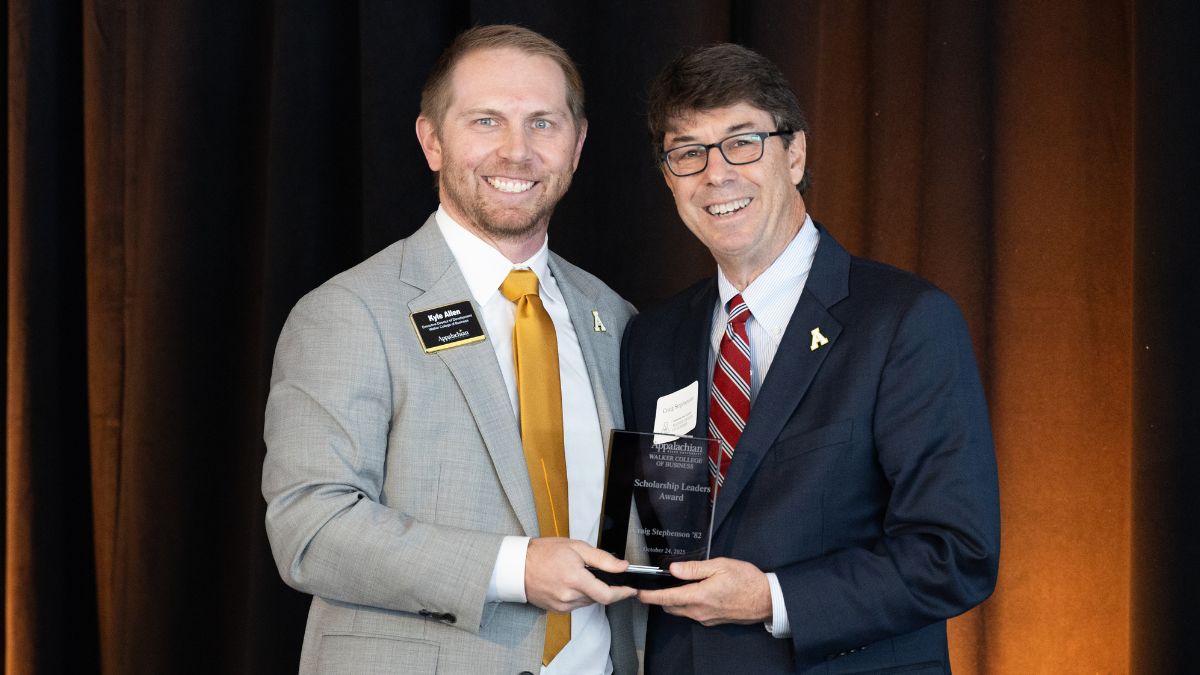 Photo by Chase Reynolds Kyle Allen presents the 2025 Scholarship Leaders Award to Craig Stephenson