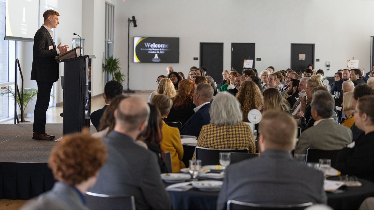 Photo by Chase Reynolds Scholarship recipient Oscar Yarbrough addresses the audience at the 2025 Walker College of Business Scholarship Reception