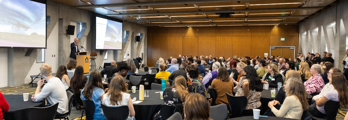 Frank Nutter speaks to a full room during the Global Good Conference.