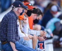 Fans wearing masks during a college football game between the Minnesota Golden Gophers and Illinois Fighting Illini on November 7, 2020 at Memorial Stadium in Champaign, ILL