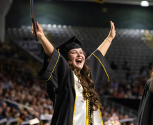 Grad at App State Fiscal years 2025 and 2026 mark the most successful fundraising years in App State’s history, with the university securing more than $50 million in private donations each year — funds that directly support App State students. During the milestone period, every major area of the university has benefited, with contributions supporting academics and athletics. Pictured, an App State graduate celebrates at App State’s Spring 2026 Commencement, held May 7–9 on the Boone campus. Photo by Chase Reynolds