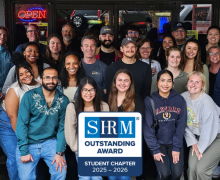 A large group of SHRM members in Boone and a SHRM logo