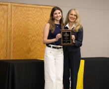Grace Lisi, left, received the "Top Student Overall" plaque from Dean Sandra Vannoy. Photo by Sabrina Cheves