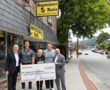 Pictured, from left to right, are App State Vice Chancellor of University Advancement Will Sears, Adam Scherer ’01, Mountaineer Mania general manager Anna Powell, Reese Raulston, a sophomore electronic media/broadcasting major from Mooresville and Mountaineer Mania employee, and App State Chief Operating Officer and Executive Vice Chancellor J.J. Brown. Appalachian State University has received significant support from alumni Scherer and Preston Powell ’01, co-owners of the Mountaineer Mania team store on K
