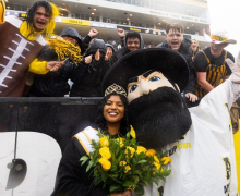 Zoe Raj Supply chain management major Zoe Raj stands with Yosef after being named App State's 2026 Top of the Rock