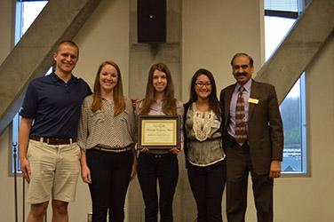 Appalachian Supply Chain club representatives, pictured from left, Tyler Sawyer, Stacey Hall, Ashley Kirkland, and Ashley LaManna along with faculty advisor Supply Chain Management professor Dinesh Dave' accept a Membership Development Award.