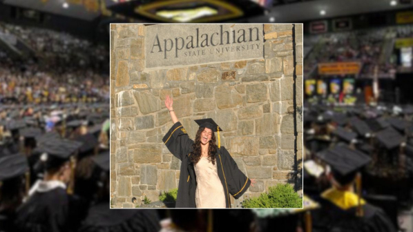 Carly Court in front of Appalachian State University sign