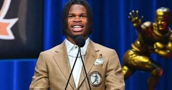 Colorado Buffaloes cornerback Travis Hunter, the 2024 Heisman Trophy recipient, wears a custom blazer designed by Mitch Purgason. Courtesy of Mitch Purgason.