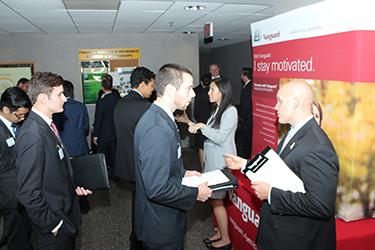 Students interacting with business leaders at Business Connections event