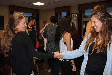 Students shaking hands