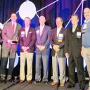 Brantley Risk & Insurance Center Associate Director Greg Langdon, left, presented IIANC CEO Aubie Knight, second from left, and members of the IIANC Board of Directors Scott Evans, Jeff Haney, Bill Vogedes, Jim Mozingo and past Chairman Bobby Salmon