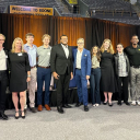 Members of App State’s Rho Chapter of Gamma Iota Sigma with App State alumnus Todd Campbell ’87, president and CEO of Builders Insurance Group, center, in App State’s Holmes Convocation Center on March 21, 2025, after his Boyles Lecture titled “Risk and Reward: The Transformative Power of YES in Business and Life.” Under Campbell’s leadership, Builders Insurance Group has made a $500,000 commitment to App State’s Walker College of Business, to support the modernization of the college’s Brantley Risk and Ins