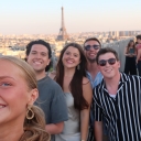 2023 cohort participants (L-R) Lulu Ambrose, Andrew Bressler, Mackenzie Naylor, Connor Marx and Finn Jarrell enjoy the view from the Arc de Triomphe in Paris.