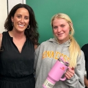 Lauren Solomon '06 MKT with students who earned Stanley Quencher cups for their engagement