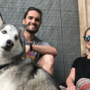Chase Warrington '08 and his wife, Allison, and their 50-pound husky Koda in Valencia, Spain, where they live and work remotely