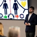 Steven Vogel, a second-year graduate student in the Industrial-Organizational Psychology and Human Resource Management program, presents at App State's 3MT competition January 24, 2025