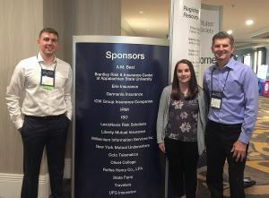 Appalachian students Joshua Johnson, left, and Kate Ciesinski with Dr. David Marlett at the CPCU Society Annual Meeting