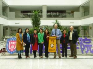 Pictured are Wendy Deng, Sandra Vannoy, Christopher Lytle and Martin Meznar with their counterparts at Northeastern University in Shenyang