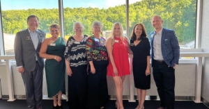 Dawn Medlin, center, with colleagues and mentees (from left) MSADA Director Jason Xiong, CIS Lecturer Laura Brewer, Doris Medlin, Dawn Medlin, Victoria Fowler, Dean Sandra Vannoy and Executive Director of Development Kyle Allen