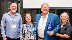 Davis, second from right, receives the Daughtridge Lifetime Achievement Award