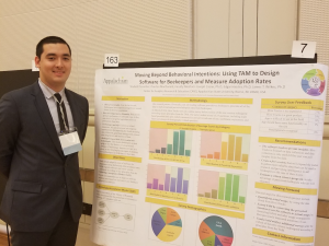 Preston MacDonald with his research poster at the 2018 State of North Carolina Undergraduate Research and Creativity Symposium
