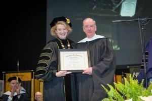 Chancellor Sheri N. Everts of Appalachian State University with Richard G. Sparks, who received an honorary Doctor of Humane Letters degree during Fall Commencement for his service to the community. Photo by Marie Freeman