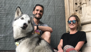 Chase Warrington '08 and his wife, Allison, and their 50-pound husky Koda in Valencia, Spain, where they live and work remotely