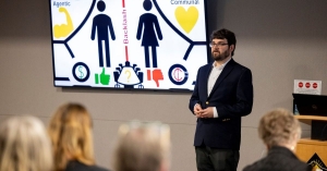 Steven Vogel, a second-year graduate student in the Industrial-Organizational Psychology and Human Resource Management program, presents at App State's 3MT competition January 24, 2025