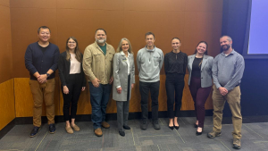 From left are Dr. Jason Xiong, Emily Charlip, Dr. Jeff Kaleta, Dr. Sandra Vannoy, Dr. David Dickinson, Anna Silva, Karlee Cook, and Dr. Dennis Guignet