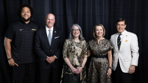 App State’s Alumni Association recognized four Mountaineers at the university’s 2026 Alumni Awards Gala, held July 11 on the Boone campus. Pictured with App State Chancellor Heather Norris, center, from left to right, are Young Alumni Award recipient Kendall Lamm ’14, Honorary Alumni Award recipient Shawn Poole, Outstanding Service Award recipient Donna Fiori ’80 and Distinguished Alumni Award recipient Dr. M. Lee Barnes ’90. 