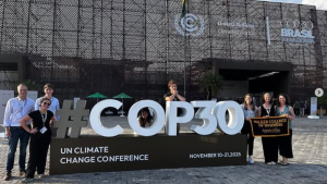 App State students and faculty with the COP30 sign in Brazil