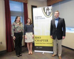 From left, students Peyton McAvoy, Shelby Weatherman with NCAMIC President Mike Williams at Appalachian State University