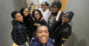 The Harris family celebrates their Mountaineer legacy: Two members are App State alumni and two are current students at App State. Pictured in front is Tony Harris II, a first-year student at App State with a major in risk management and insurance.