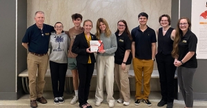 From left are Dr. Chris McNeil, Ella Fabion, Connor Perdue, Ashley Meacham, Sarah Bergin, Hailey Martin, Enzo Ramos, Amelia Griffith, and Tori Humler.