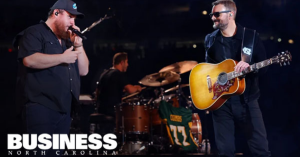 Luke Combs, left, and Eric Church perform at Concert for Carolina on Saturday, Oct. 26, 2024, at Bank of America Stadium in Charlotte.