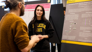 This year’s Celebration of Student Research and Creative Endeavors will be the largest in App State history, with 240 students participating. Pictured, an App State student presents their research poster during last year’s event. 