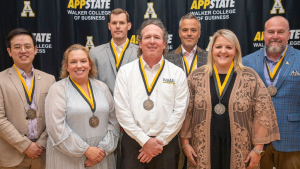 The seven App State faculty and staff recipients of the Walker College of Business’ 2025 Sywassink Awards for Excellence. Pictured, from left to right, are Dr. Bao Duong, Samantha Williams, Dr. Justin Cox, Dr. Scott Hunsinger, Dr. Ash Morgan, Lauren Stansberry and Bond Jones.