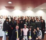 Appalachian and Fudan Holland Fellows students at Krispy Kreme headquarters